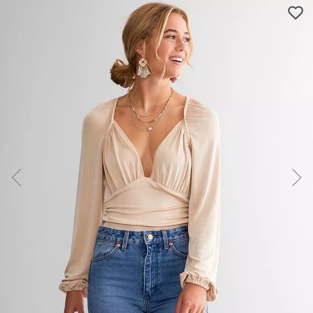 Free people in your arms bodysuit in blossom pearl color